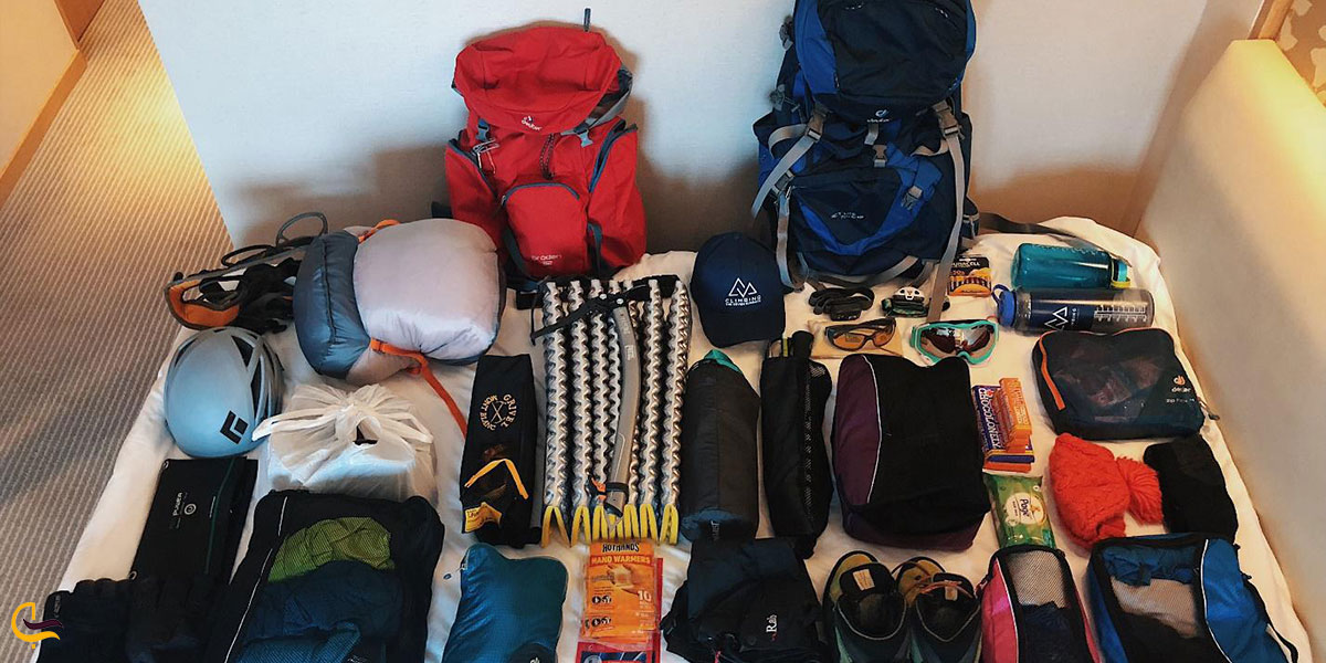 عکس تجهیزات برای پیاده روی رسیدن به ابشار